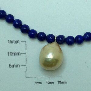 Lapis Lazuli Beads and Baroque Cultured Pearl Pendant Necklace.